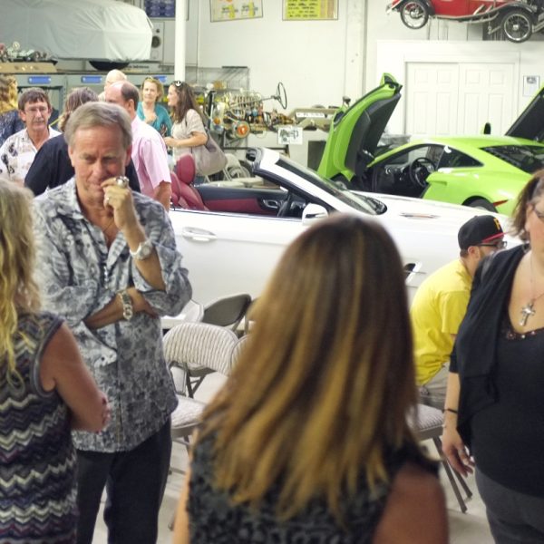Ron engaging with a tour group at DFW Elite Toy Museum
