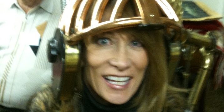 SSG Museum Linda Old hair dryer from the turn of the century delights a visitor to Salon & Spa Museum