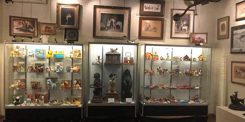 dogs-in-art-collectibles rare toys on display at DFW Elite Toy Museum